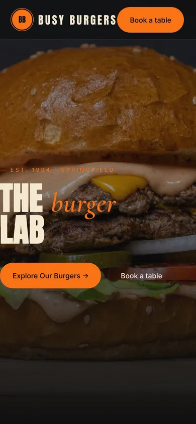 The BUSY BURGERS restaurant website on a phone