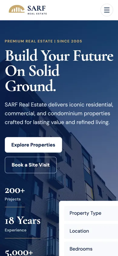 The SARF REAL ESTATE real estate website on a phone